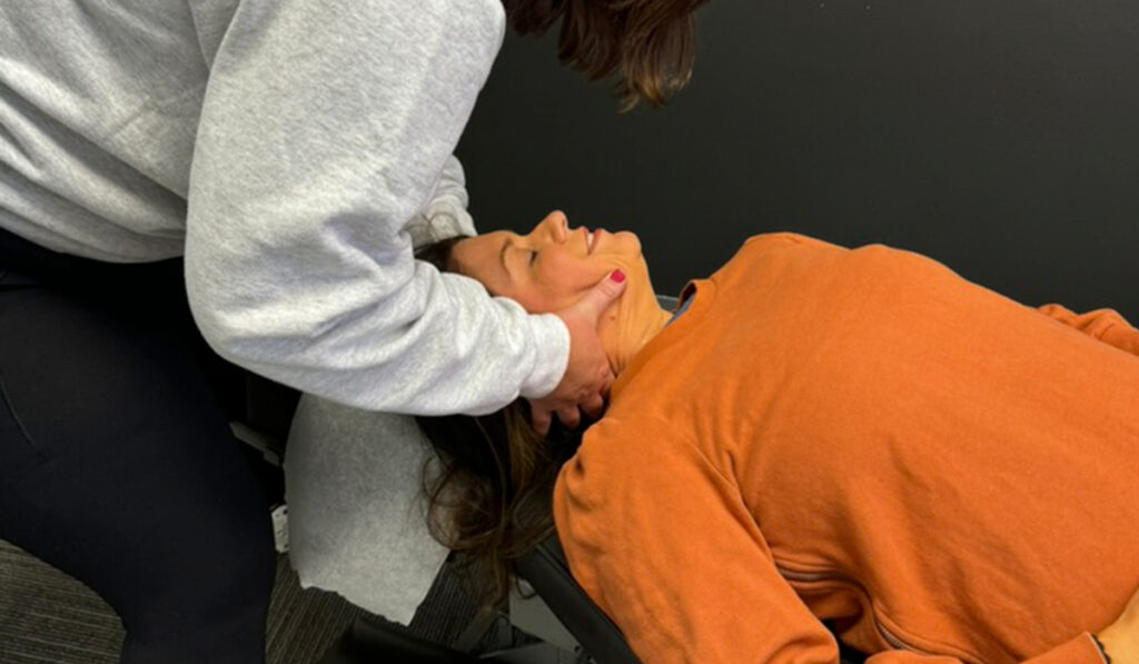 A patient is being treated by a Chiropractor at HealthSource of Downtown Mokena.