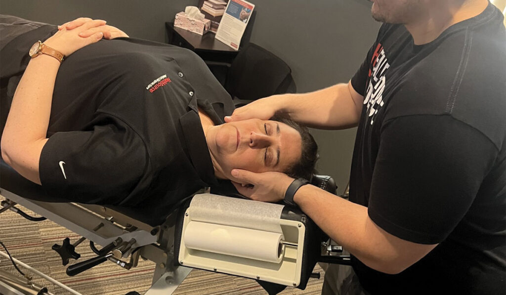 A patient at HealthSource of Troy receiving a Chiropractic Adjustment.