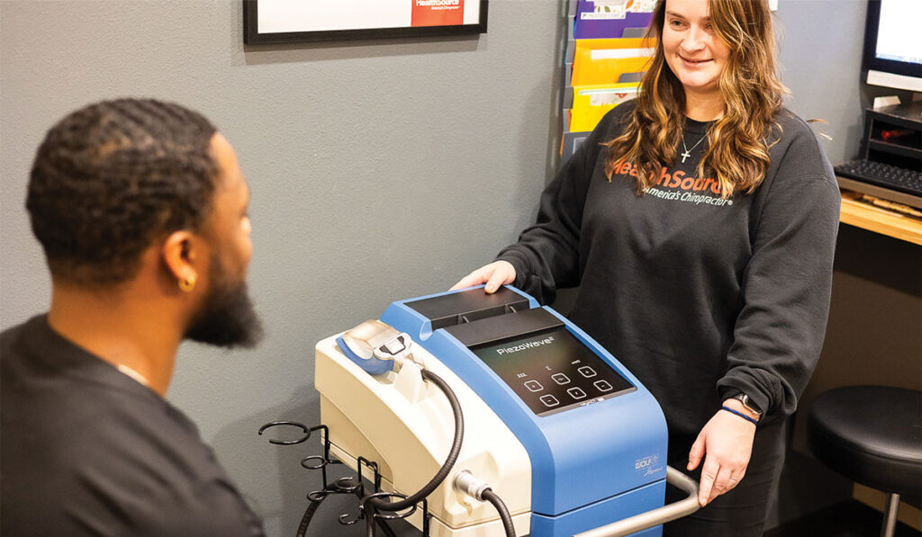 A patient preparing to receive Shockwave Therapy at HealthSource of Pensacola.