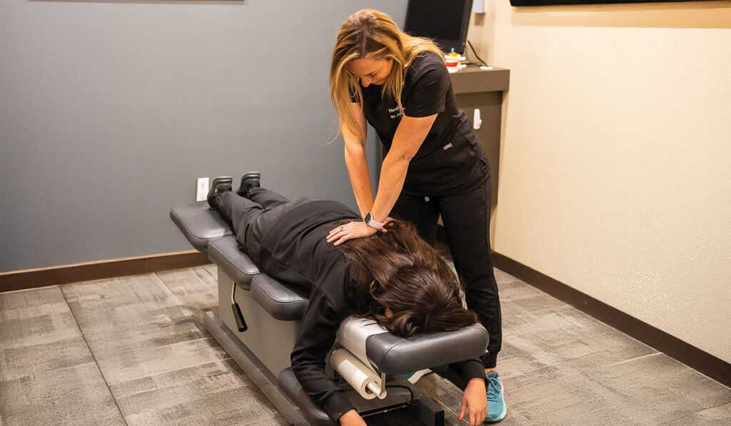 Patient receiving a Chiropractic adjustment at HealthSource of Pensacola.