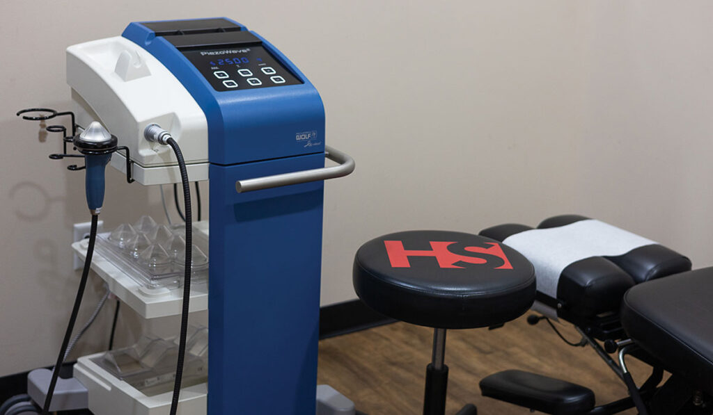 Shockwave machine in treatment room at HealthSource of Spanish Fort.