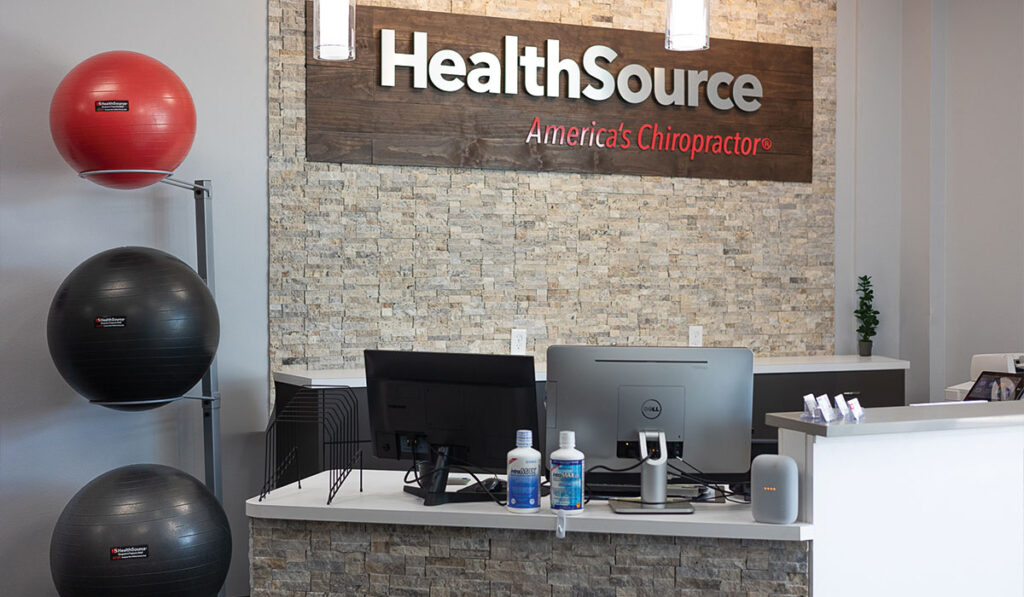 Front desk and reception area at HealthSource of Nine Mile.
