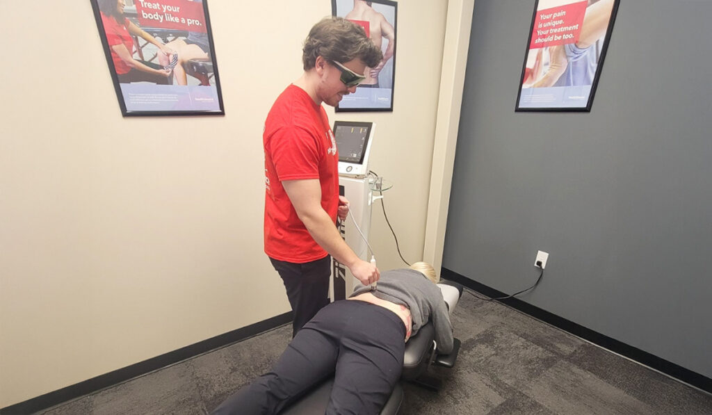 A patient receiving Class IV Laser Therapy at HealthSource of Mankato.