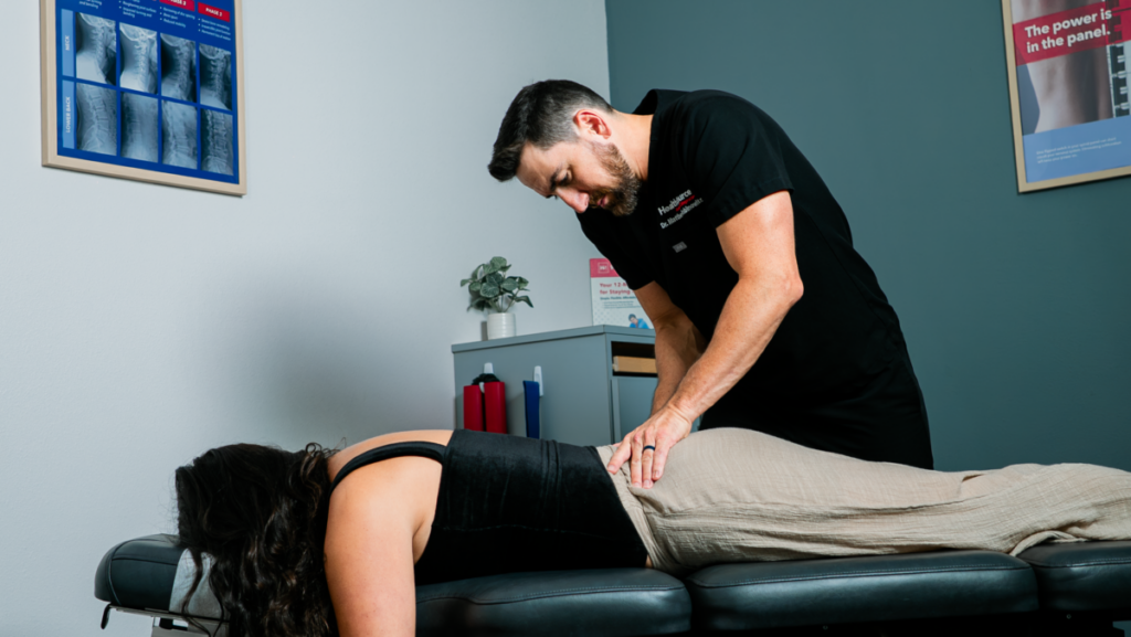 Patient receiving a chiropractic adjustment.