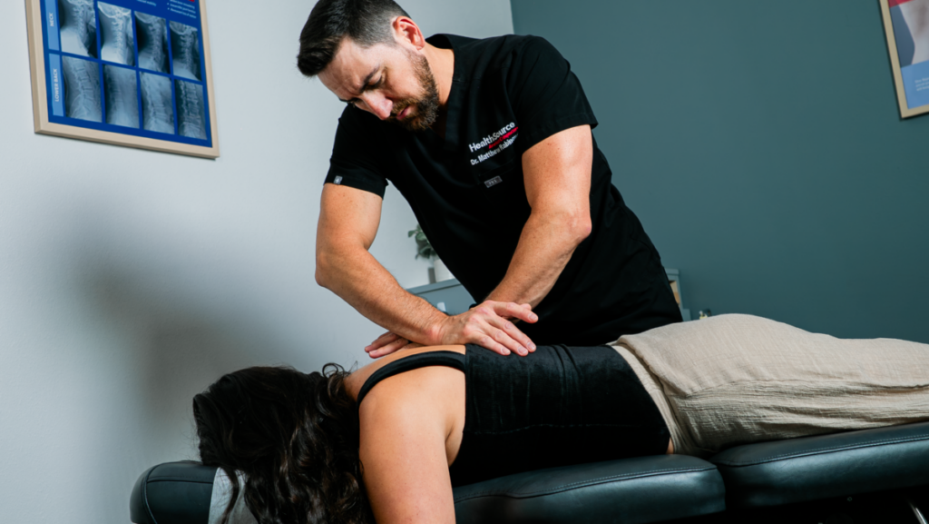 Patient receiving a chiropractic adjustment.