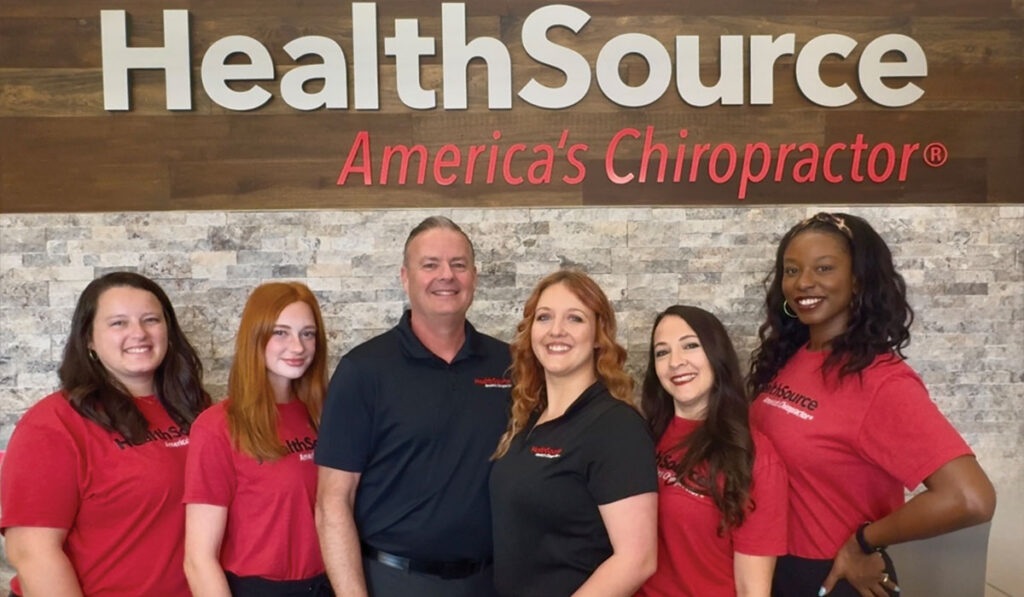 The full team at HealthSource of Huntsville - The Rocket City standing together.