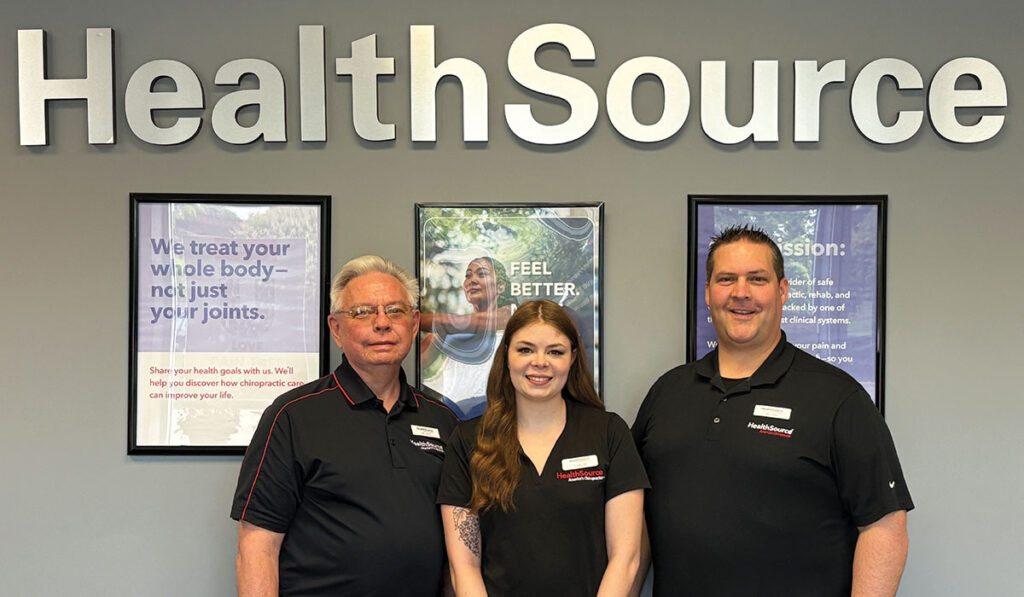 Dr. David Fandrich, Dr. Dean Bechard and Carlie at HealthSource of Champlin.