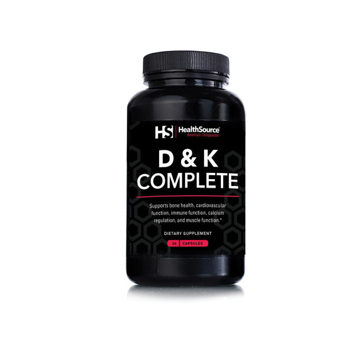 Vitamin D & K supplement bottle on white background.