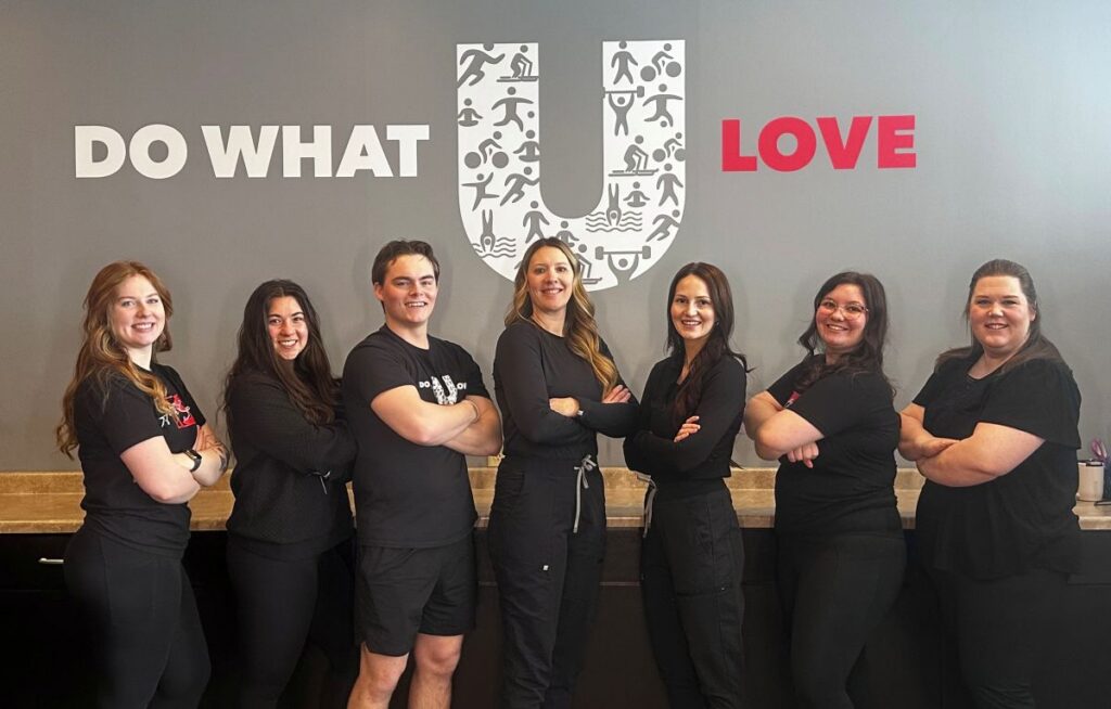 The team at HealthSource of Duluth, posing together in the clinic.