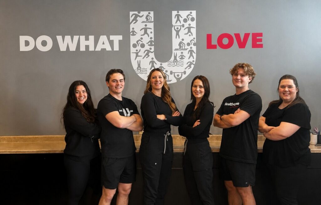 The team at HealthSource of Duluth, posing together in the clinic.