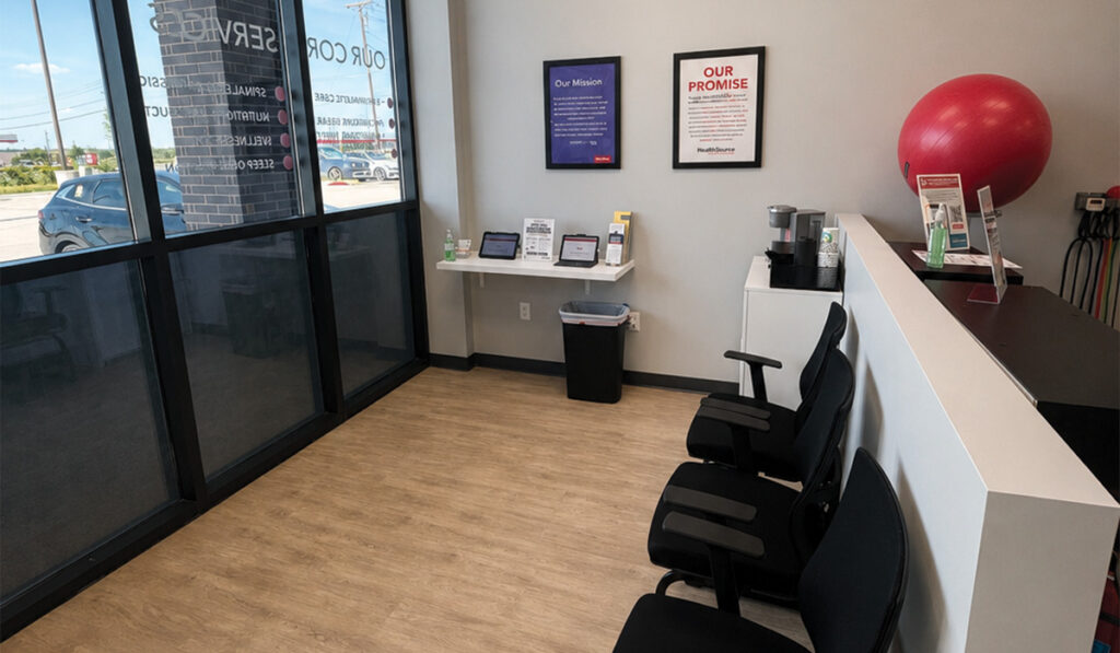 The reception area and patient check-in area at HealthSource of Burleson.